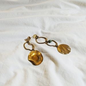 Surrealistic asymmetrical chain earring